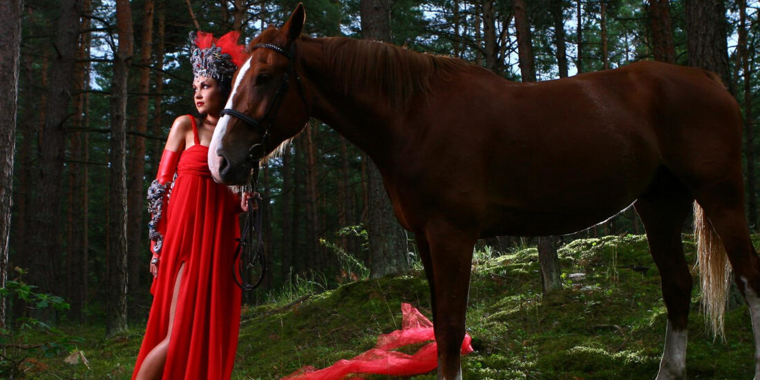 Photo session with a beautiful woman with brown horse in the Vesuvius National Park