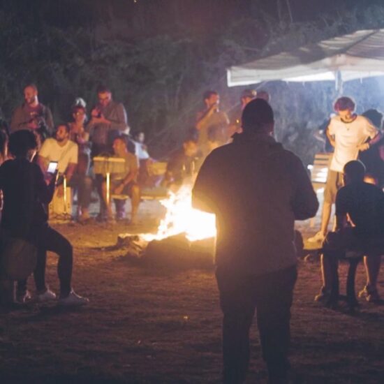 bonfire surrounded by people in the Vesuvius National Park